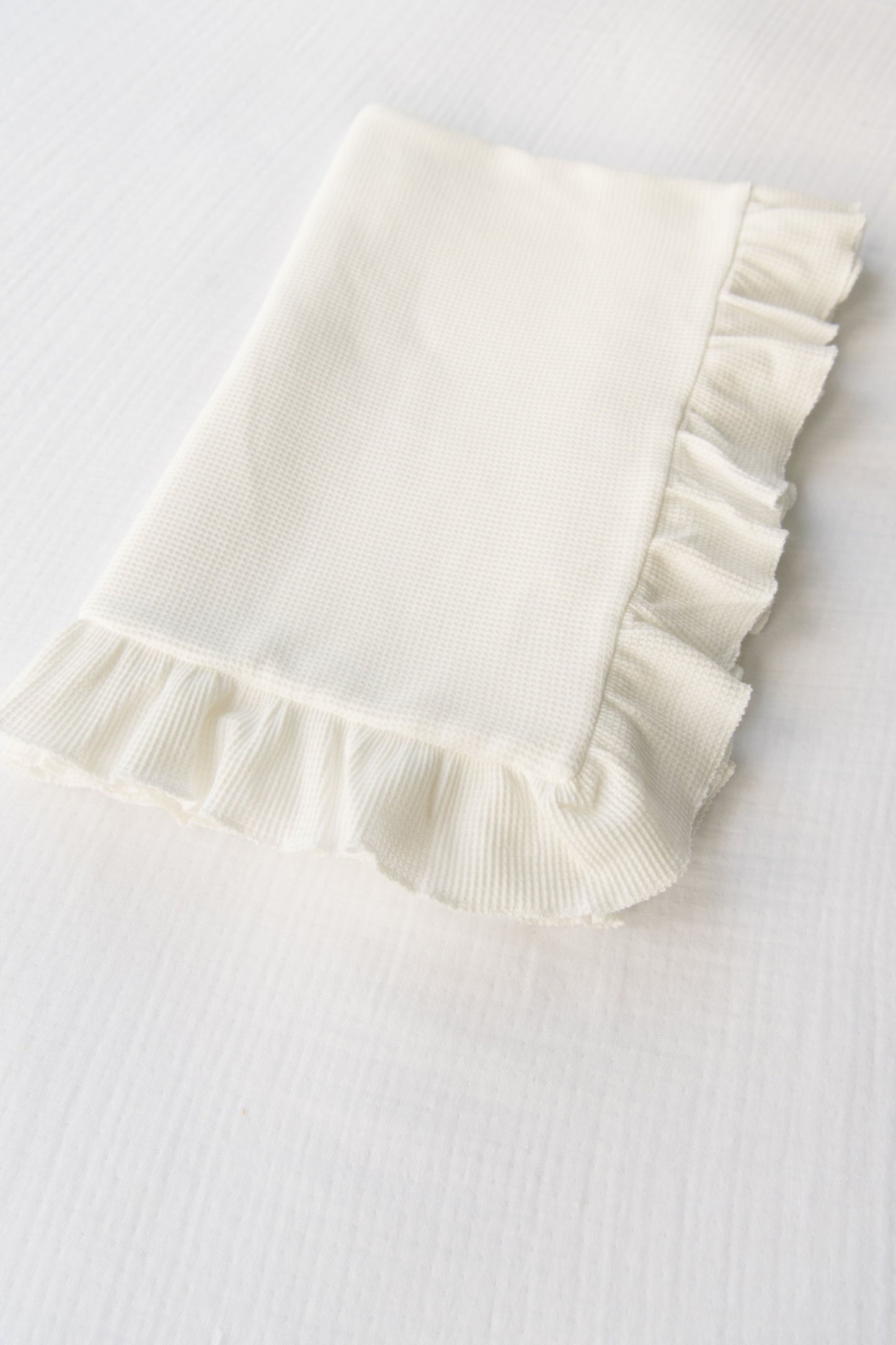 Embroidered Knitted Ruffled Blanket