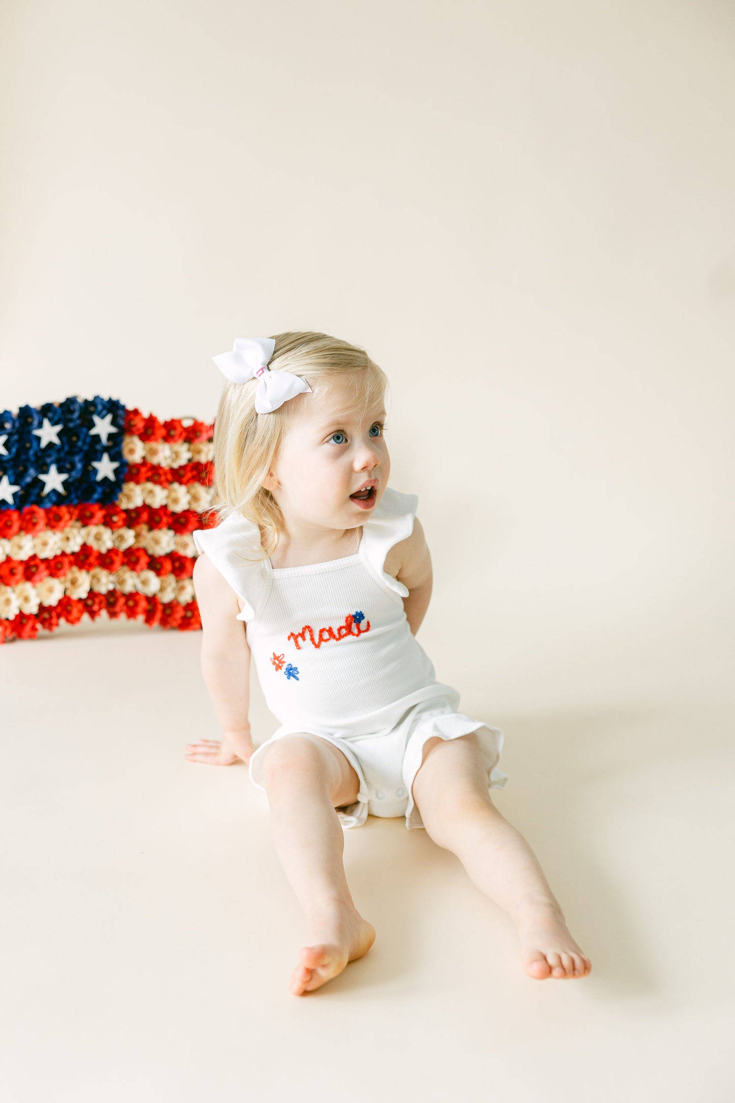 Custom Patriotic White Ruffle Romper with Bow