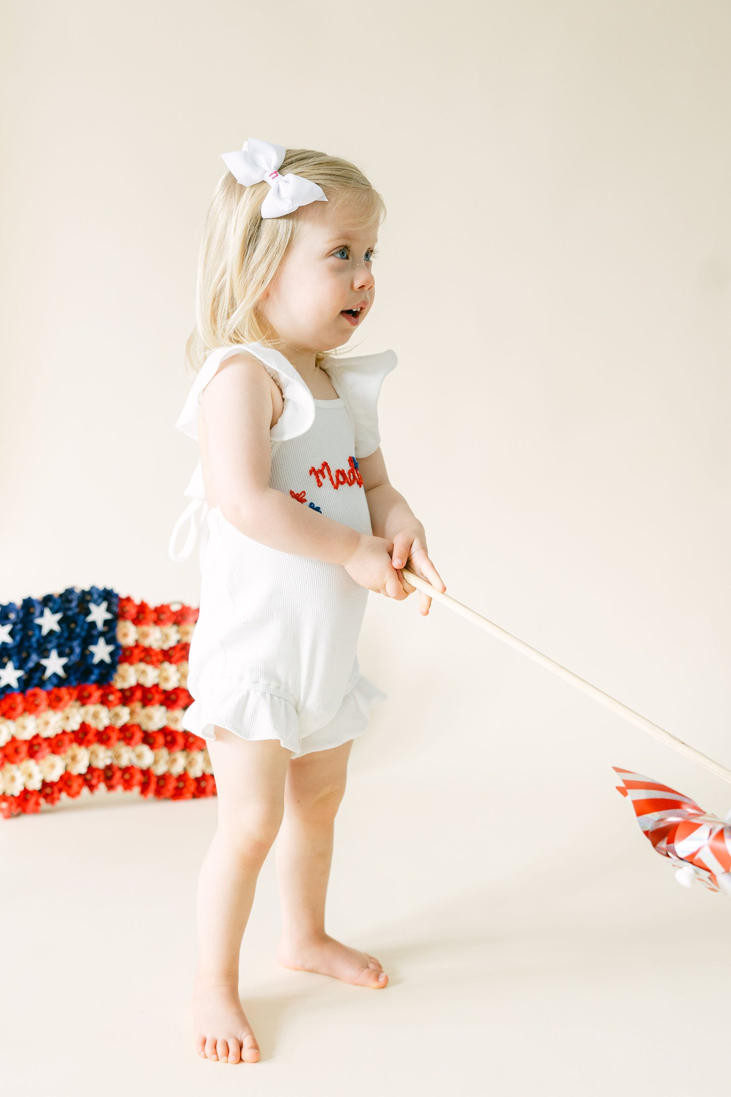 Custom Patriotic White Ruffle Romper with Bow