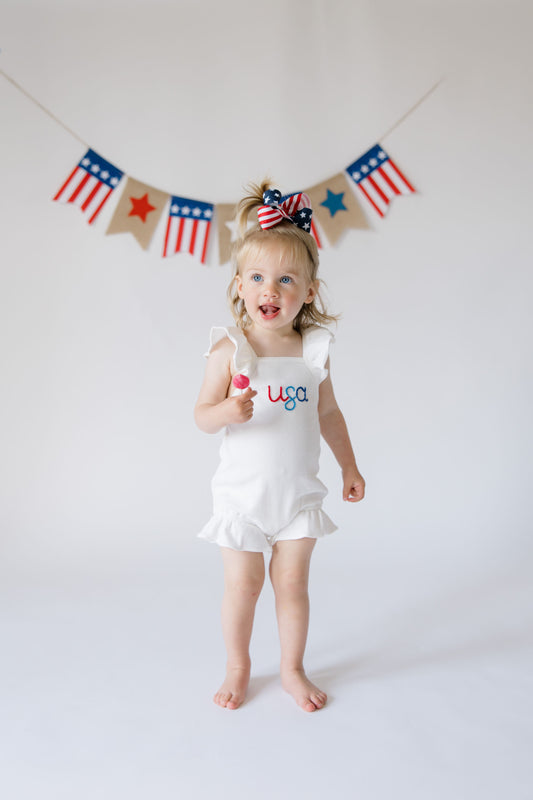 Custom Patriotic White Ruffle Romper with Bow