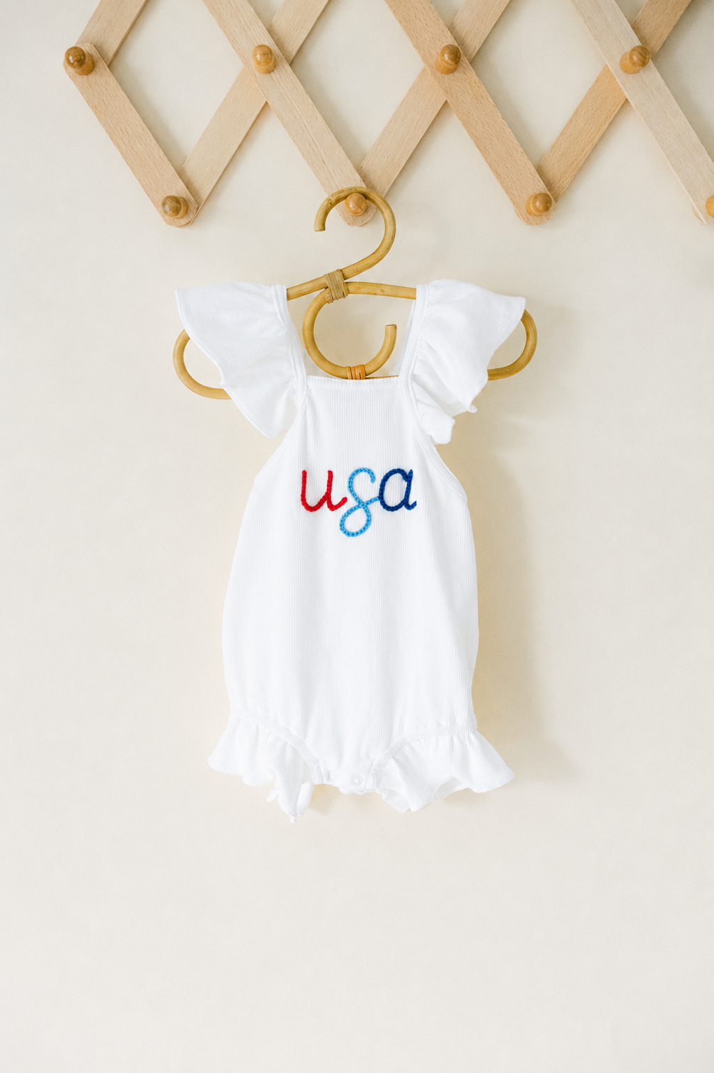 Hand Stitched White Ruffle Romper with Bow
