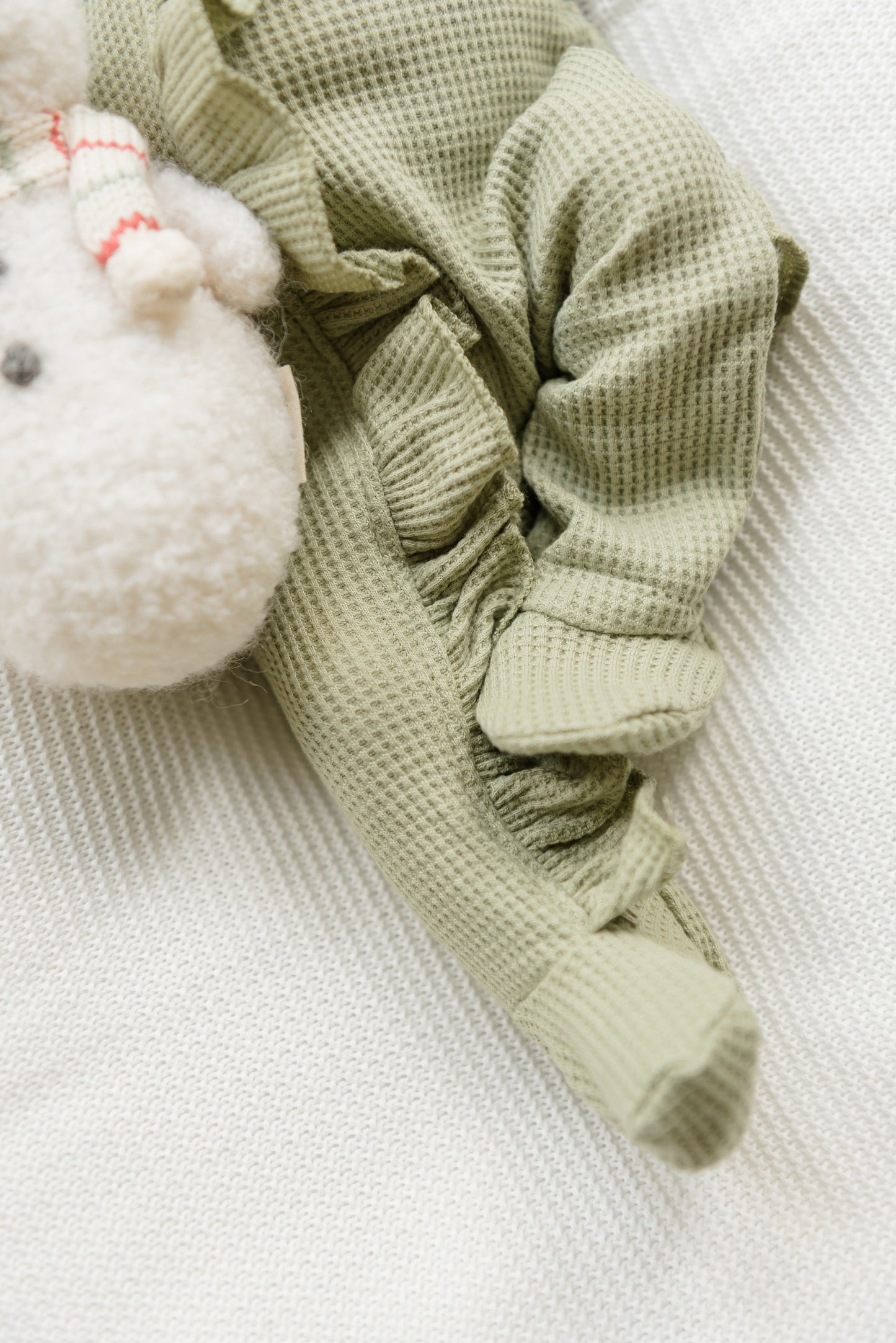 Organic Waffle Knit Ruffled Footie With Bow - Holiday
