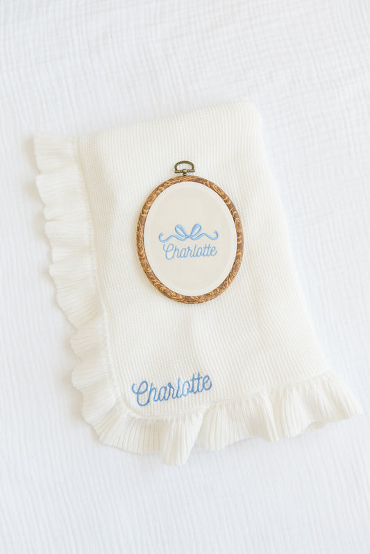 Embroidered Knitted Ruffled Blanket